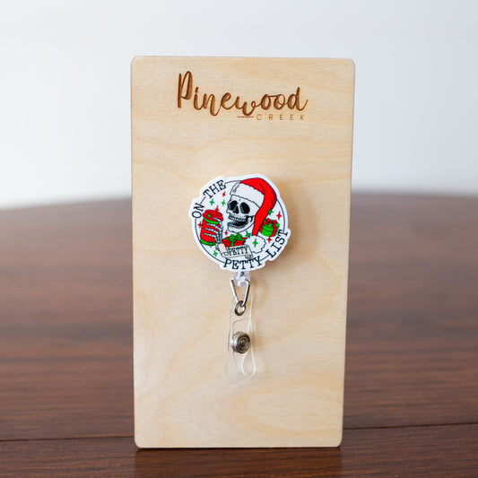 On The Petty List Santa Skeleton Badge Reel