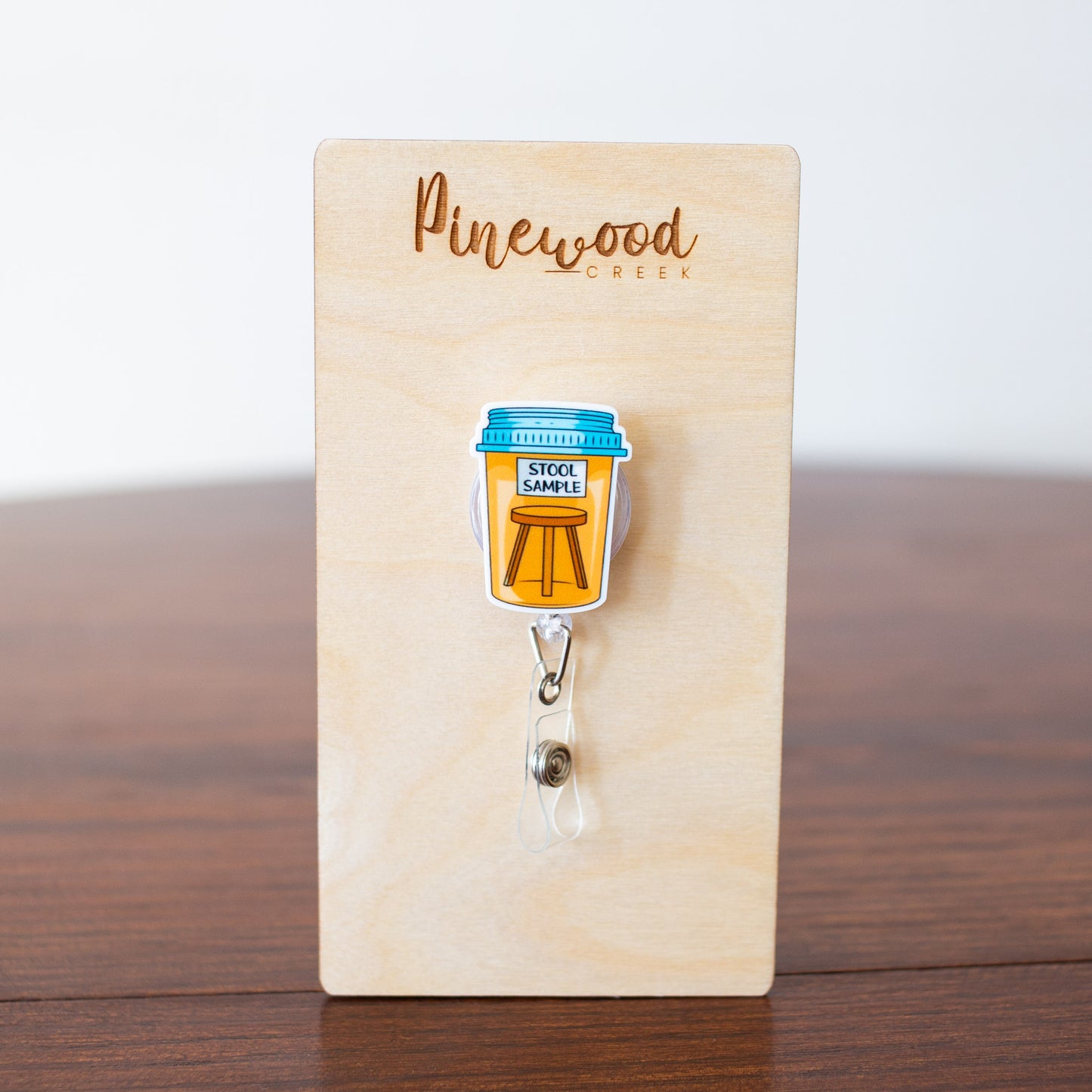 Stool Sample Badge Reel