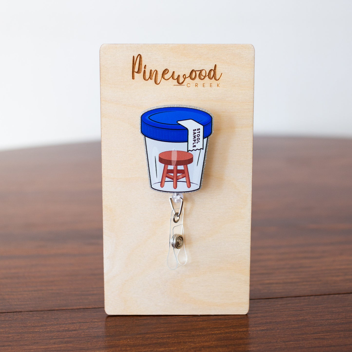 Stool Sample Badge Reel