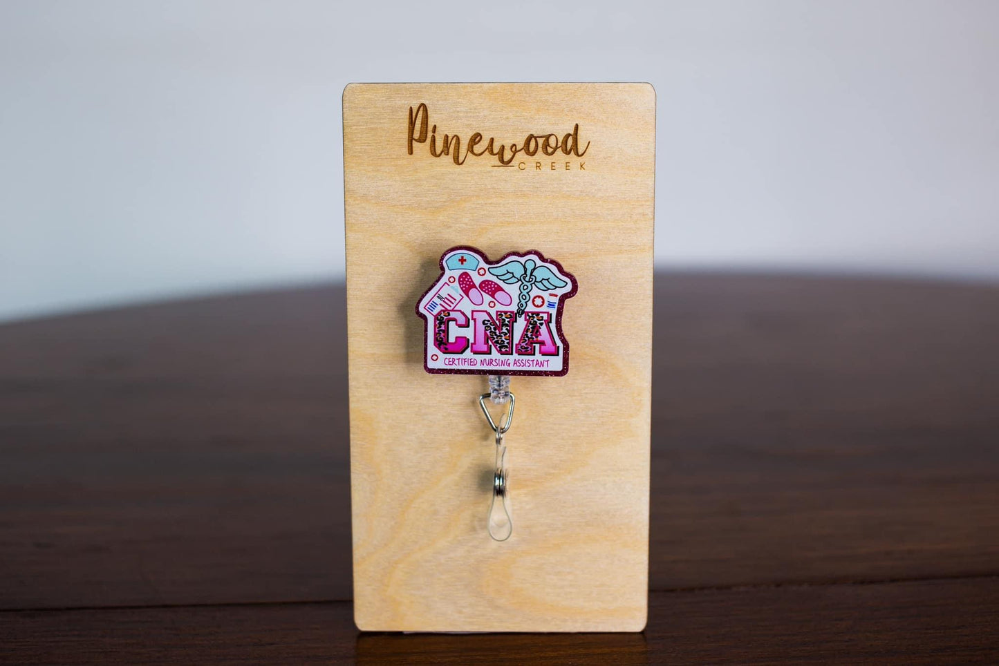 CNA Pink Leopard Letters Badge Reel