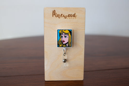 Aurora Comic Book Square Badge Reel