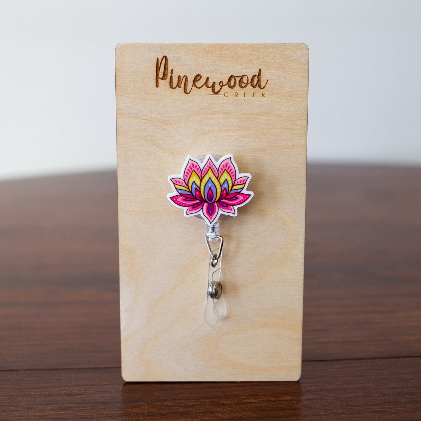 Retro Lotus Flower Badge Reel